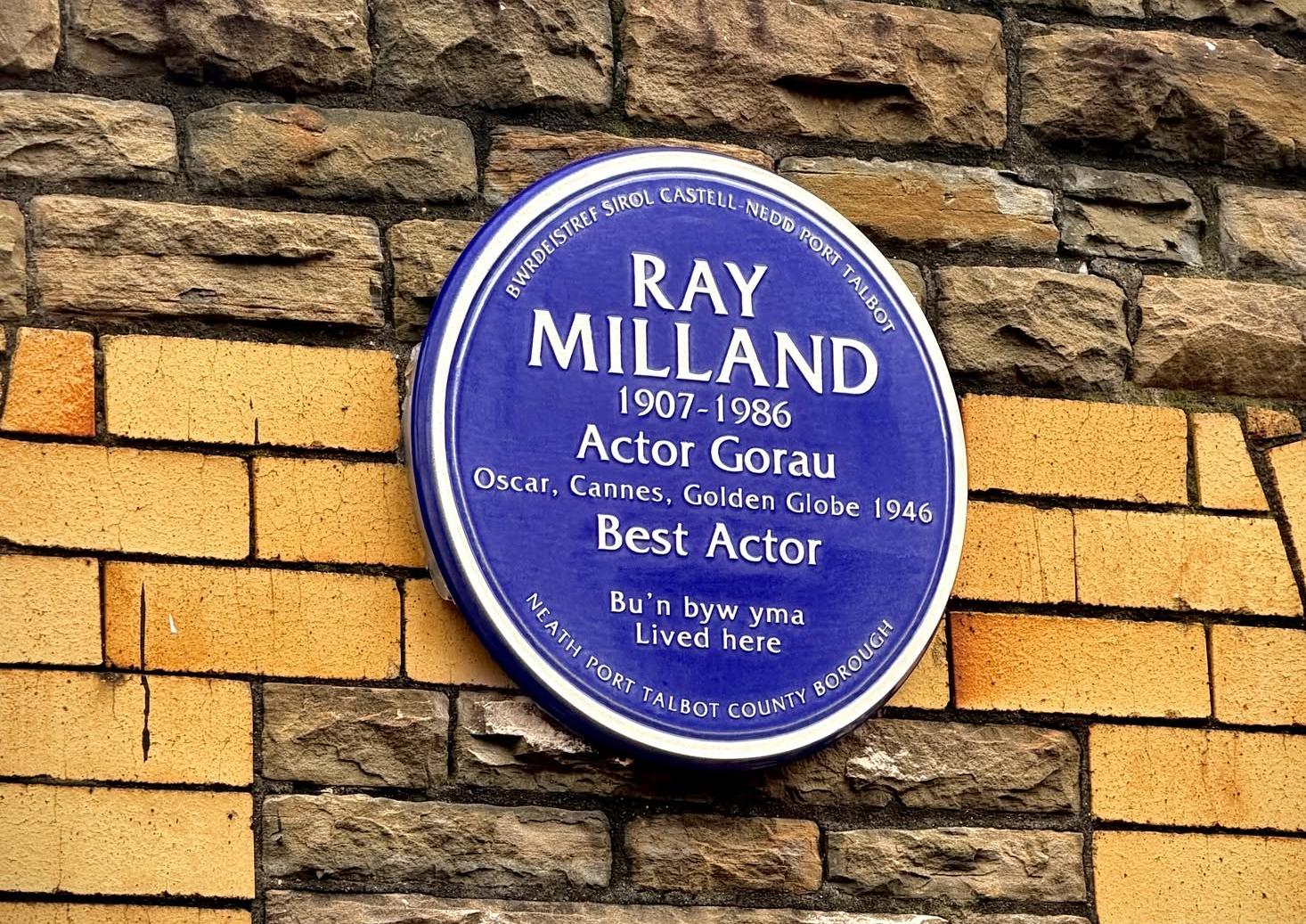 Ray Milland's Blue Plaque on a brick all