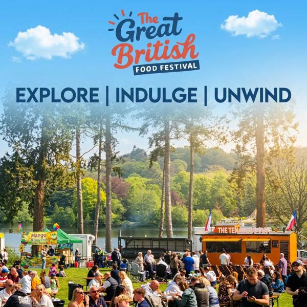 A poster for 'The Great British Food Festival' food stalls by a lake with people eating and playing games
