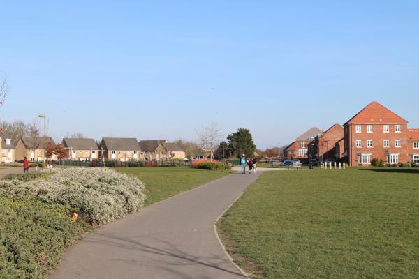 Great Western Park pathway with houses in the background
