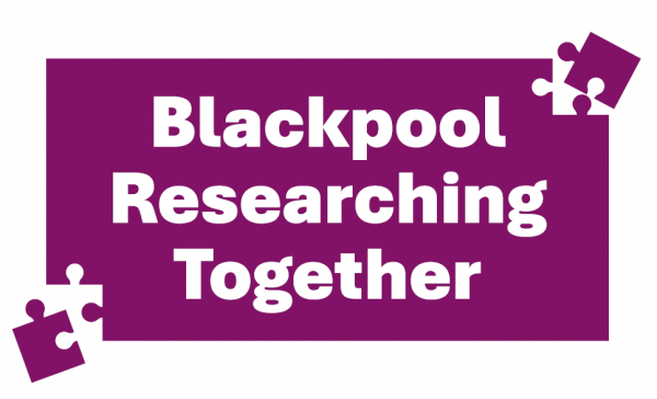 Purple jigsaw with Blackpool Reseaching Together written on top in white.