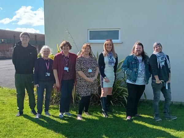 Community co-researchers gathered outside in the sunshine.