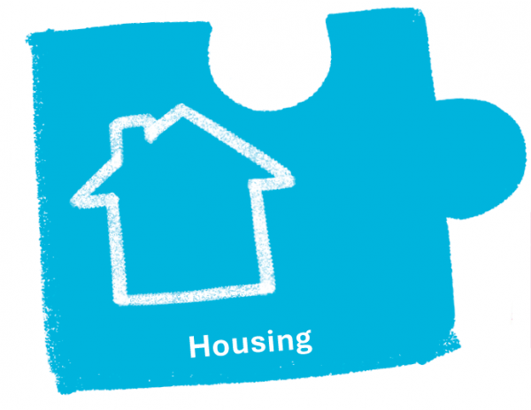 Blue jigsaw piece with white outline or house and word housing.