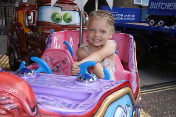 Young child on a children's ride