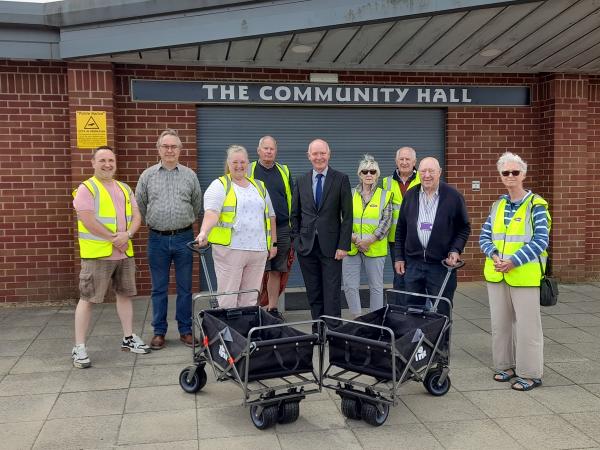 Wisbech St Mary Street Pride group receive new trollies. Front, from left, chairman Sarah Bligh, Cambridgeshire and Peterborough Police and Crime Commissioner Darryl Preston, Fenland District Council's Portfolio Holder for Environment Cllr Peter Murphy.