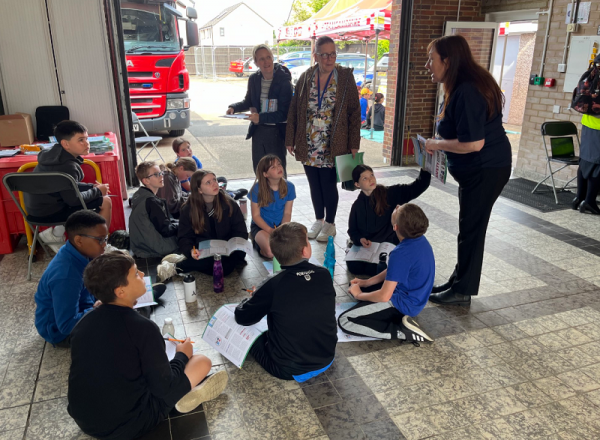 Rosie Cooke, from Fenland District Council's Community Safety team, talks to youngsters from Park Lane Primary School in Whittlesey.