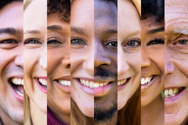 A diverse array of faces smiling