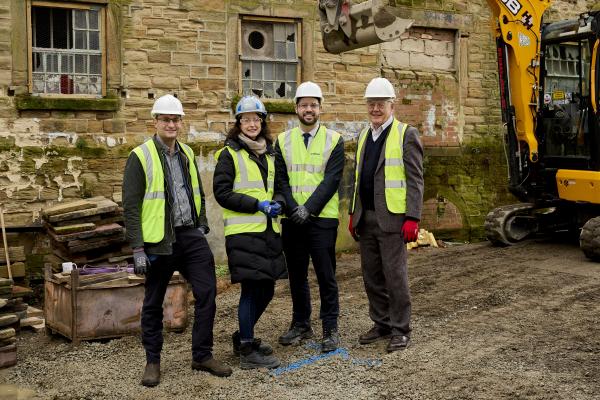 A photo of Tom Frater, Regional Director North East and Yorkshire.at Historic England, Louisa Brooks at  City and Provincial Properties, Cllr Michael Graham, Cabinet Member for Regeneration and Economic Growth at Wakefield Council,and Duncan Wilson, Historic England’s Chief Executive on site.