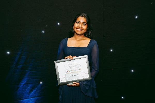 Anns Antony with her REACH Award Certificate