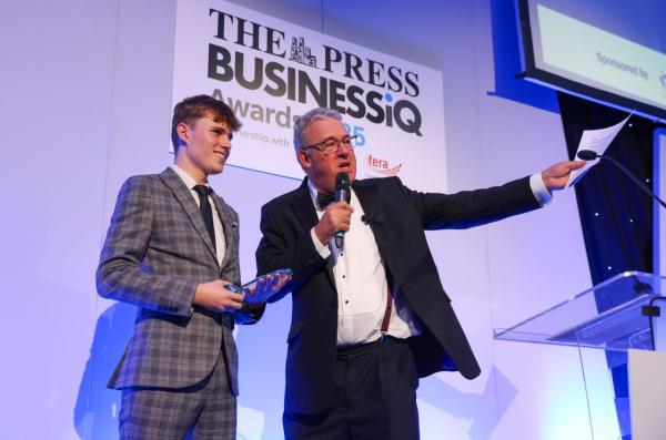 Aeddan winning his award