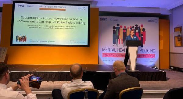 Police and Crime Commissioner Lisa Townsend standing presenting at the National Police Chief's Council Conference on Mental Health and Policing