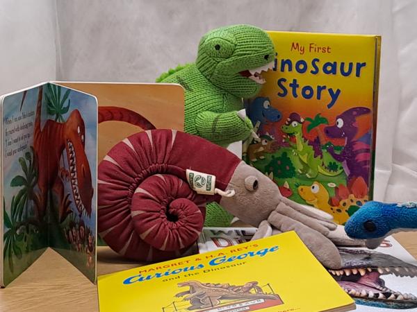 a selection of books and soft toys