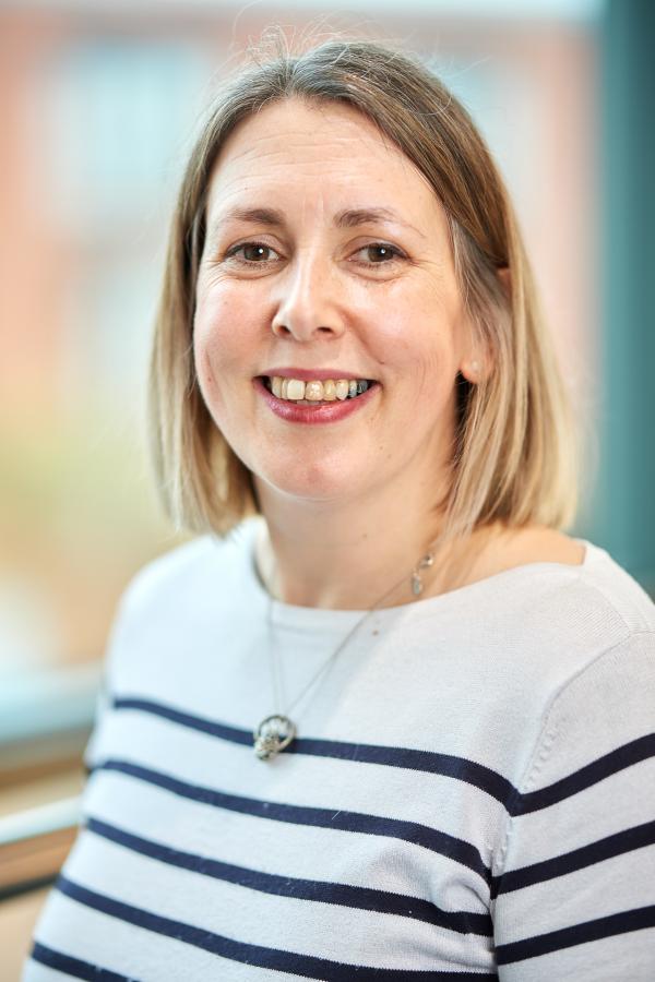 A person smiling at the camera