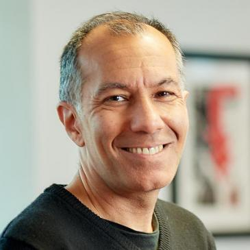Kapil Sayal is smiling at the camera