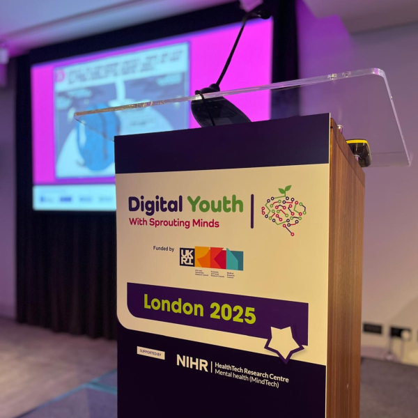 A lectern featuring the words Digital Youth London 2025