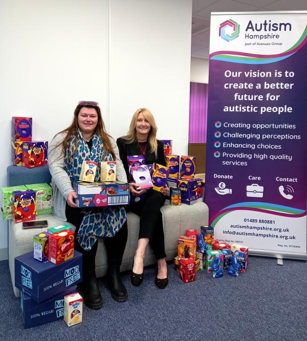Nikita from AECOM sits surrounded by Easter eggs with our colleague Danielle.