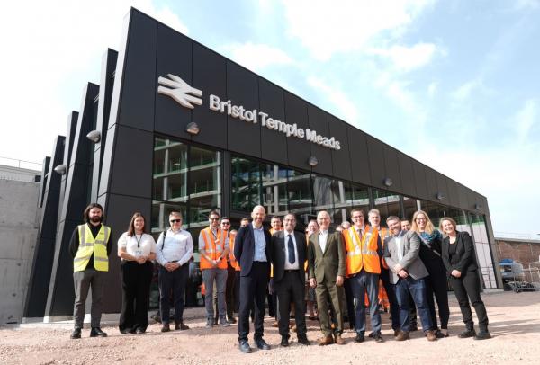 Project partners and stakeholders pose for a photo in front of the new Eastern Entrance to Bristol Temple Meads station. 