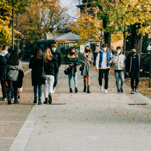 Young people wearing medical masks