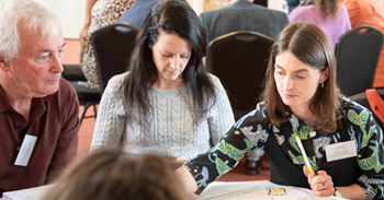People at a conference doing a group activity