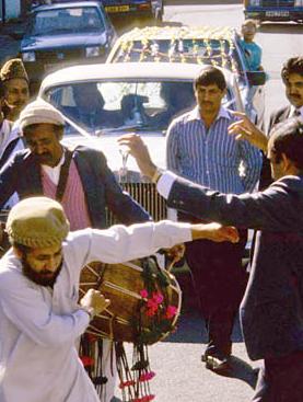 Archive image of Pakistani wedding celebrations in a street in Wakefield