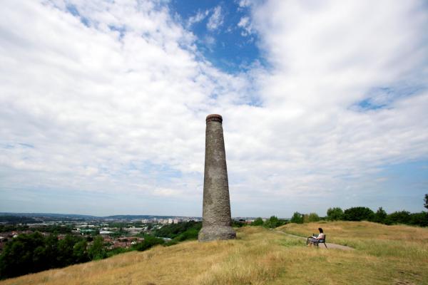 Image of chimney on top of Troopers Hill with east Bristol in the distance