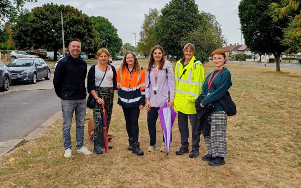 Bristol City Council housing colleagues and partners stood together while on a community walkabout