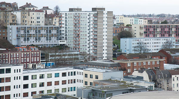 A cityscape photo of Bristol with a view of colourful high-rise residential buildings