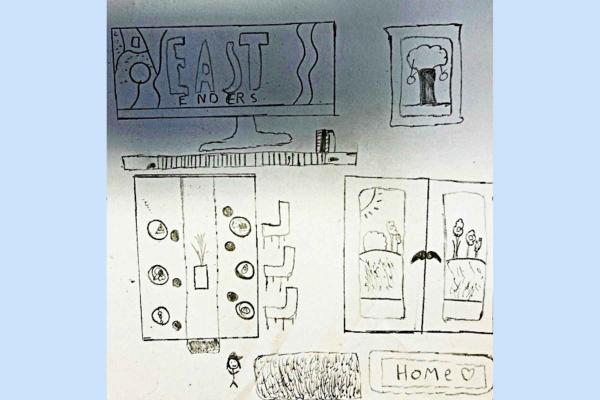 A sketch by a teenager who is reflecting on 'homeley'. There is a sketch of a table laid out for dinner, with a plant on the table. There is a big TV screen saying eastenders and a sketch of a mat that says Home